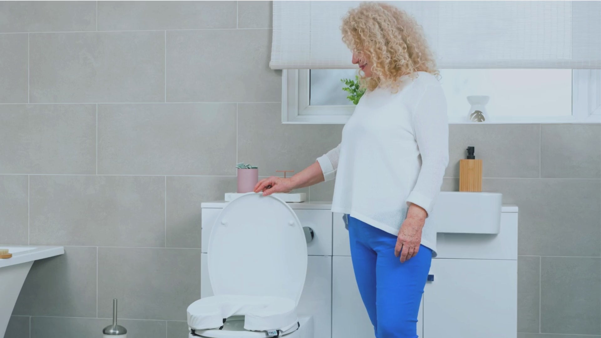 Ergo Creations 2-inch padded toilet seat cushion for enhanced comfort and mobility support, showing installation, features, and everyday use for seniors and post-surgery recovery.